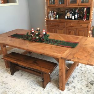 Custom handmade wooden dining room table with leafs